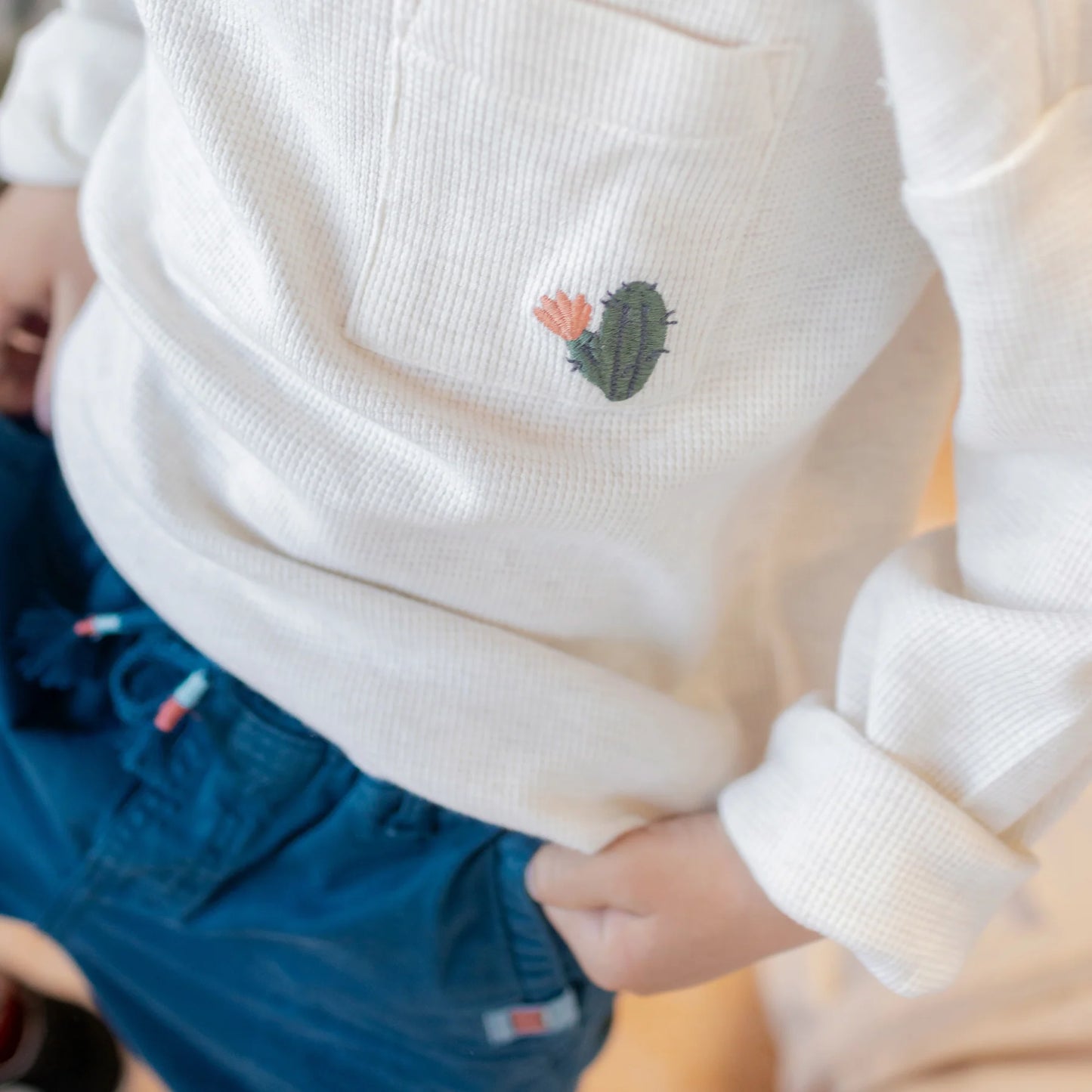 Child Cream Long Sleeved T-Shirt with Henley Collar in Waffled Cotton